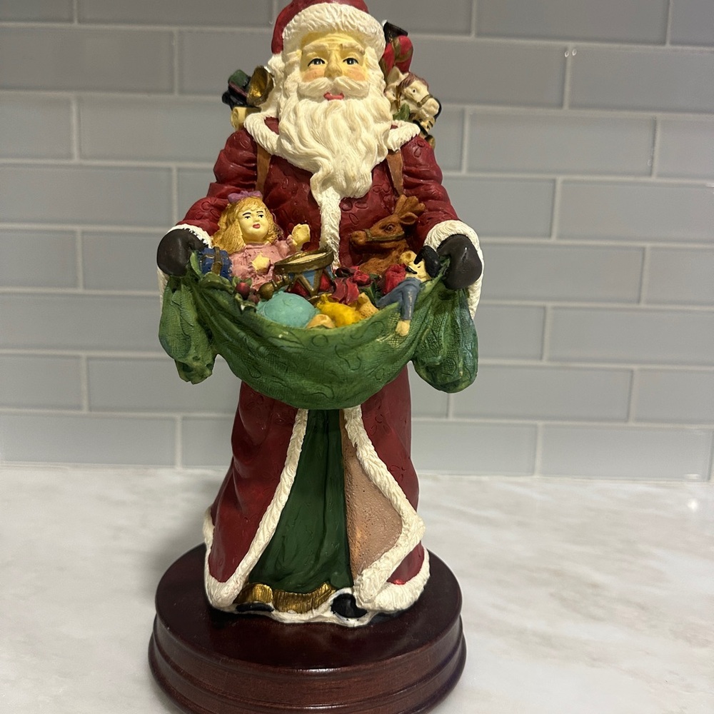 Festive Wind Up Musical Santa Claus Figurine with Toys